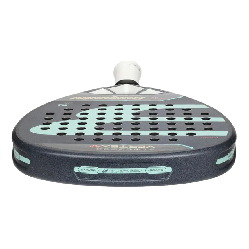 Close-up of the Bullpadel Padel Racket Vertex 04 Woman 2024 Delfi Brea, featuring a diamond-shaped perforated surface and textured grip for high-level play, with a logo and text. Dark color scheme with light blue accents.