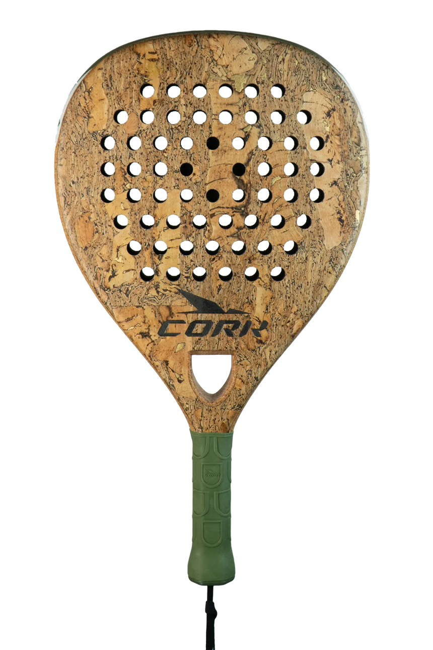 Introducing the Cork Padel Supreme Power III Racket: a cork-patterned padel racket with a light brown, textured surface and black grip. Crafted for offensive players with high carbon composition, it features multiple circular holes and a centered black logo. The handle includes a wrist strap.