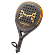 The Mack Starke Mack Pro 2.0 2024 Black is a teardrop-shaped padel racket in black and orange with a geometric pattern and multiple holes. It features a handle with a wrist strap for secure play and MACK prominently displayed, highlighting the advanced EVA Black Soft PRO 2.0 design at the top.