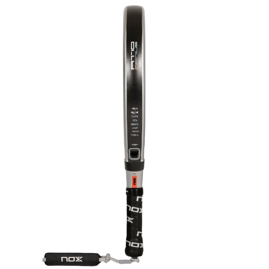 The NOX Padel Racket AT10 Genius 18K by 2024 Agustin Tapia features a side view of a black design with white branding, including NOX on the black grip. Made from aluminized carbon fiber, it integrates EOS Flap technology and a wrist strap at the handle base for secure play.