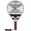 The NOX Padel Racket AT10 Genius 18K by 2024 Agustin Tapia, crafted from aluminized carbon fiber, features a silver design with a black grip and red accents. Its face has a geometric pattern with round holes and NOX displayed top and bottom, enhanced by innovative EOS Flap technology.