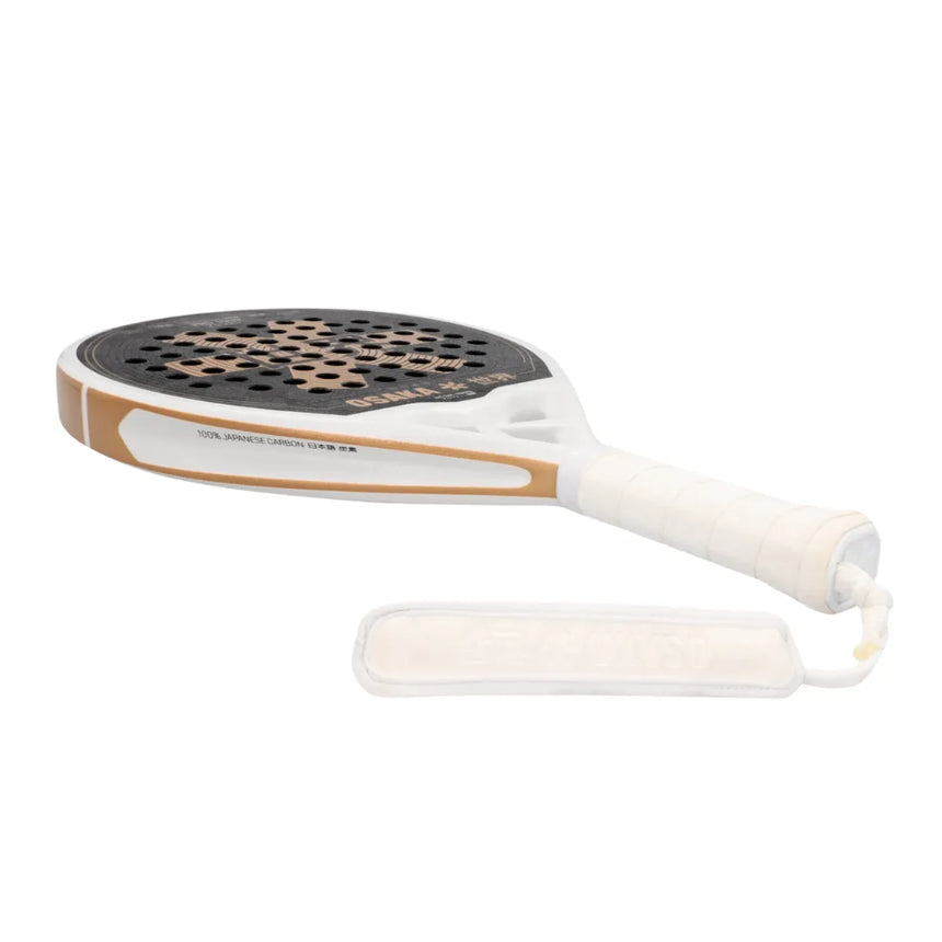 The Osaka Padel Racket Pro Tour Control 2024 (Like New) features a white and black design with gold highlights, crafted from 18K Textreme Carbon with a white grip. A white wrist strap with subtle text lies parallel, showcasing its Pro Tour Control excellence.