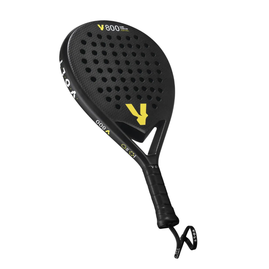 The VOLT 800 V23 Padel Racket by Volt is black with a perforated face, yellow accents, and high control via 3K carbon. It features a grip handle with a wrist strap, Fast Recovery Black Eva for enhanced play, and a sleek modern design perfect for the padel tennis court.