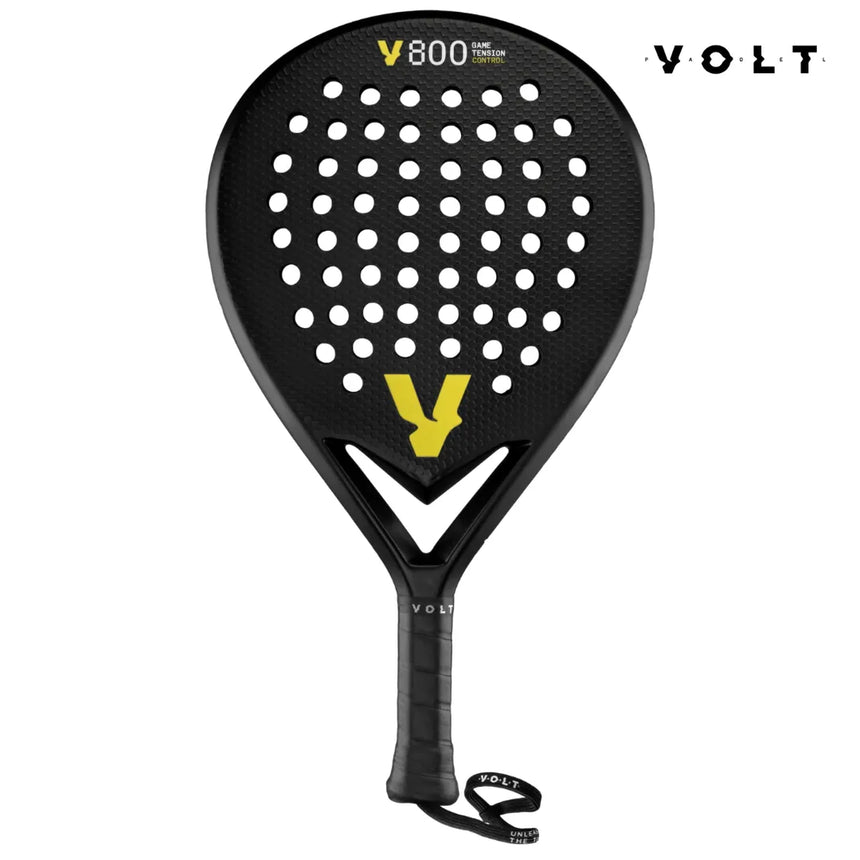 The VOLT 800 V23 padel racket by Volt features a black teardrop shape with a yellow V design and circular holes. Made from 3K carbon for high control, it has a textured grip and wrist strap branded VOLT, plus fast recovery with its Black Eva core.