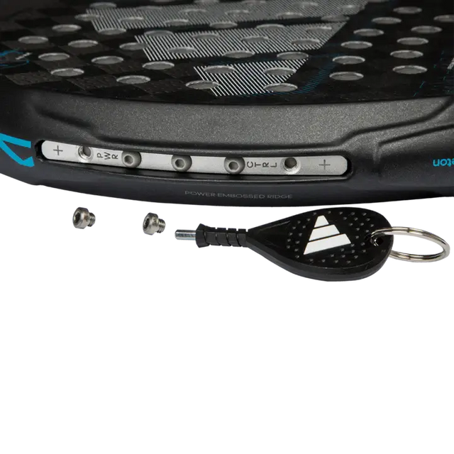 A image of adidas adipower multiweight ctrl 3.4 racket and the accessories for changing the weight of the racket. 
