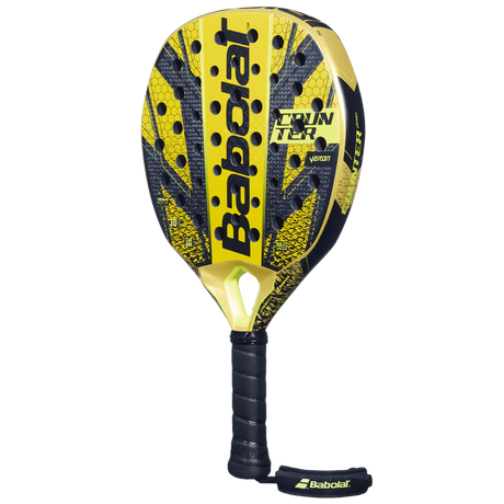 The Babolat Counter Veron 2024 Yellow & Black padel racket features CARBON FLEX technology, a perforated surface with textured design, and secure grip handle with wrist strap. The brand Babolat is prominently displayed, ideal for Counter Veron players. Condition: Like New.