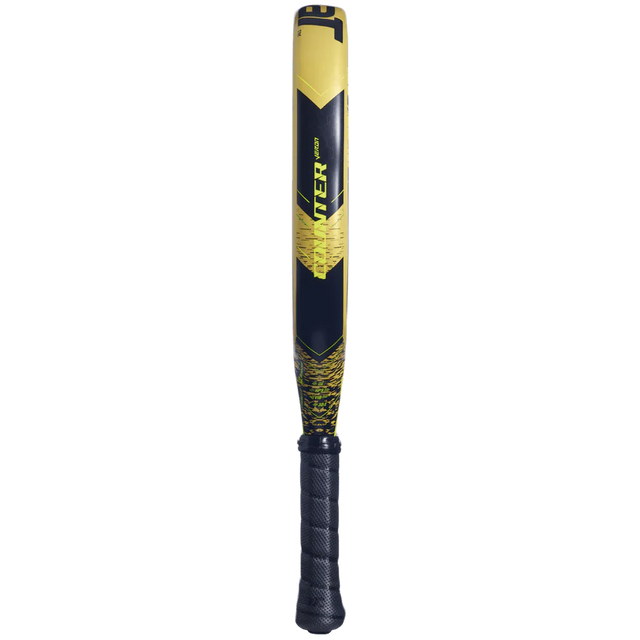 The yellow and black Babolat Counter Veron 2024 padel racket stands upright with a black grip, featuring CARBON FLEX technology for enhanced performance.