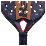 Close-up of the Babolat Technical Viper 2024 Padel Racket in black and dark orange, featuring honeycomb patterns, round holes for explosive power, 3D Spin, 12K Carbon, and Vibrasorb System text. Black grip tape wraps the handle for precision & comfort. Like new condition.