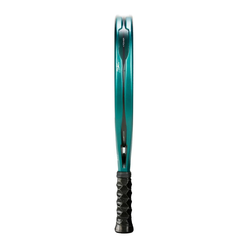 Side view of a teal tennis racket, the BULLPADEL RACKET HACK 04 2025 by Padel Smash Academy. It features Total Channel tech for enhanced play, a black textured-pattern grip for secure handling, and DUNLOP adorning the frame design.