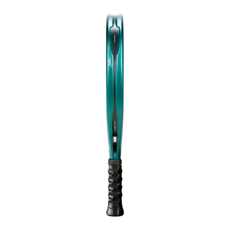 Side view of a teal tennis racket, the BULLPADEL RACKET HACK 04 2025 by Padel Smash Academy. It features Total Channel tech for enhanced play, a black textured-pattern grip for secure handling, and DUNLOP adorning the frame design.