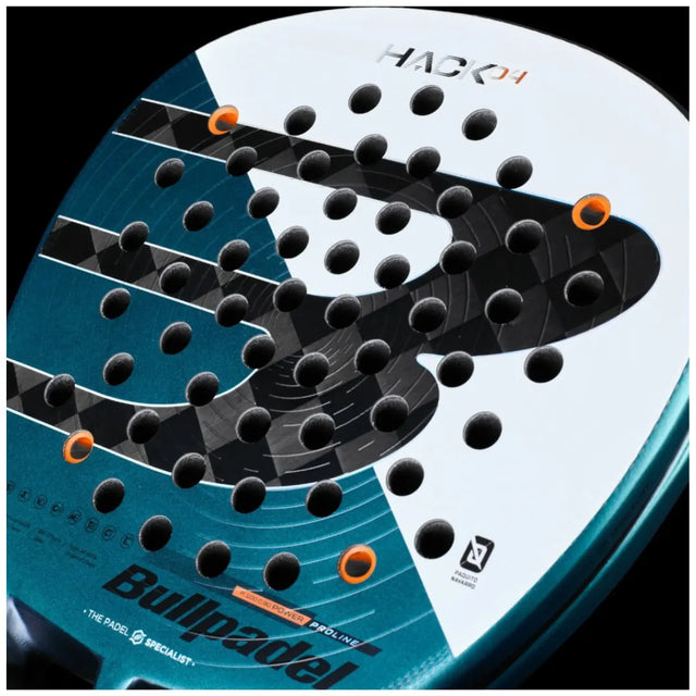Close-up of the Padel Smash Academy BULLPADEL RACKET HACK 04 2025 PAQUITO NAVARRO, featuring a modern design with black, teal, and white accents. HACK 04 stands out at the top amid orange circular grommets and a pattern of holes, enhanced by innovative Total Channel technology for superior performance.