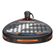 Close-up of the BULLPADEL RACKET VERTEX 04 2025 JUAN TELLO by Padel Smash Academy, like new. It features a black and orange design with a perforated face and wrist strap for total control. Dynamic patterns and branding complete its sleek look.