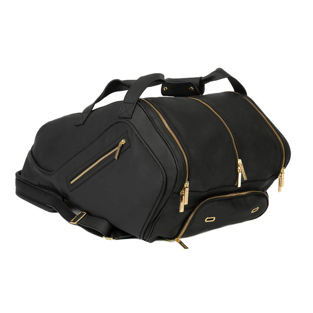 The Cork Padel Leather Thermobag is a sleek black duffel crafted from genuine leather with gold zippers and accents. It features multiple compartments, a shoulder strap, and two handles. This Portuguese-exclusive design by Cork Padel is modern and functional.