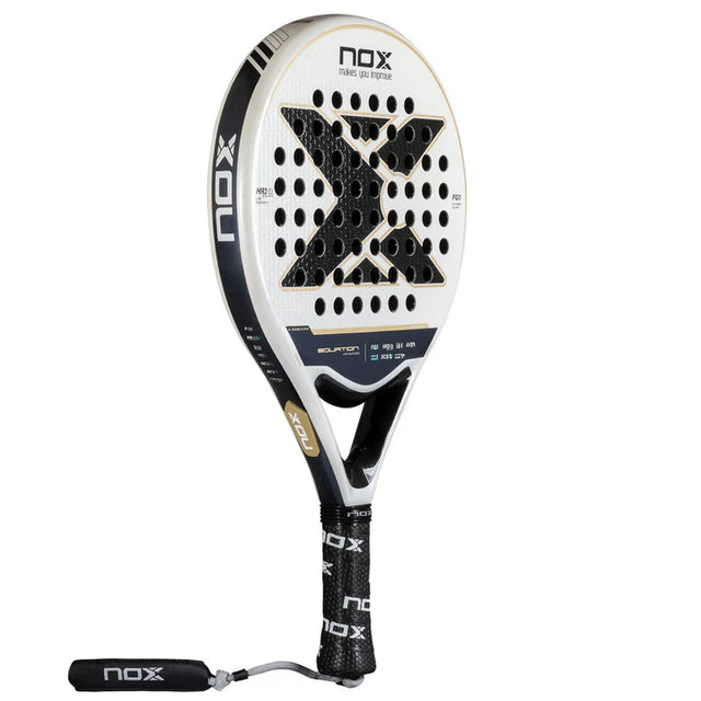 The NOX Padel Racket Equation Advanced Series 2025 features a sleek white and black design, with the NOX brand on the frame and handle, and a bold X logo on the face. Precision-engineered small holes improve aerodynamics and control for superior play.