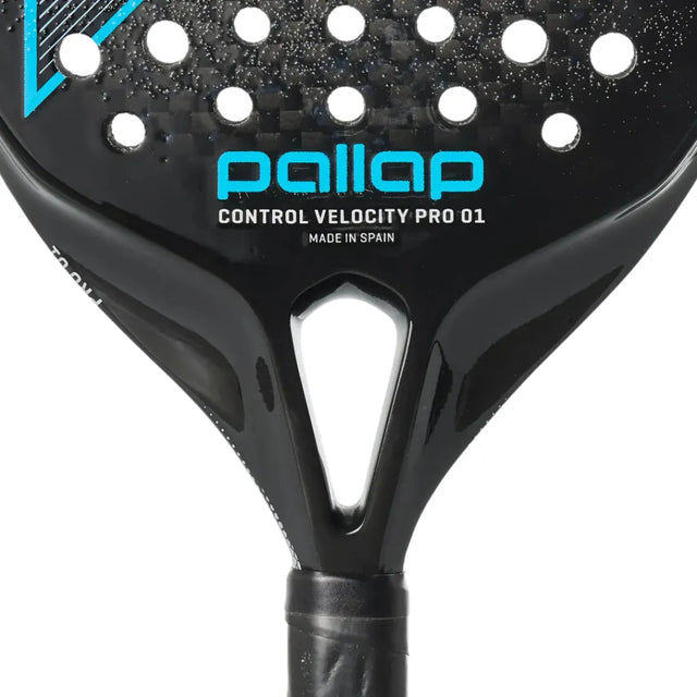 Close-up of a black Pallap CONTROL VELOCITY PRO 01 racket with a triangular throat design and blue text. Crafted for advanced players, its carbon engineering ensures precision. Made in Spain is written below, with circular holes on the surface.