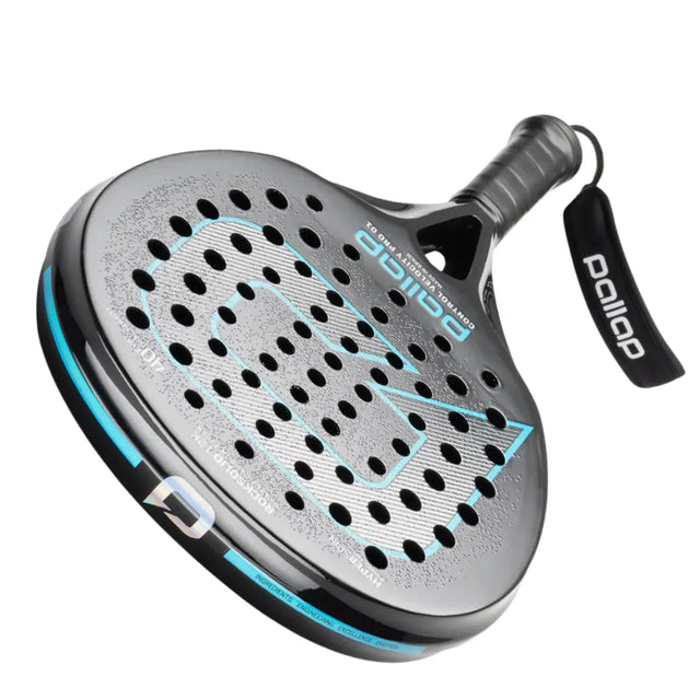 The PALLAP CONTROL VELOCITY PRO 01, perfect for advanced players, features a sleek black and grey design with circular holes and blue accents. Enhanced with carbon engineering, this Pallap racket includes a branded wrist strap on the textured handle for improved grip.