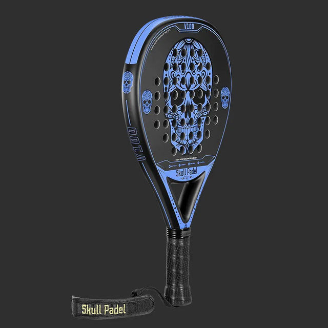 The SKULL PADEL V100 | BLUE EDITION (KIDS) by Skull Padel sports a black and blue design with an intricate skull pattern, ideal for young players. It has a wrapped grip and a strap labeled Skull Padel in vibrant yellow on a dark gray background.