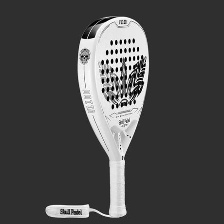 The SKULL PADEL V1100 - WHITE LEAF 24K has a white design with skulls and leaves on EVA rubber, featuring the Skull Padel branding and a branded grip strap. The model name VL100 appears against the solid black background.