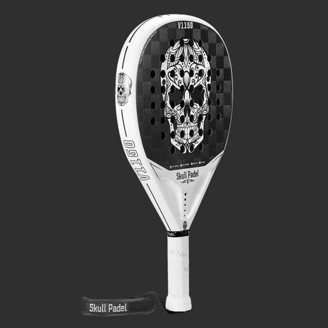 The SKULL PADEL V1150 - WHITE SKULL 24K by Skull Padel is a black and white carbon fiber padel racket with a skull design, wrapped in white grip tape featuring Skull Padel. It has an EVA rubber core against a solid black background.