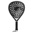 The VARLION BOURNE SUMMUM CARBON BLACK is a black padel racket with Aerodynamic Drilling technology for improved control. It features a geometric design, perforated surface, and a bidirectional carbon tubular frame. The grip has black tape and includes a wrist strap on the handle.